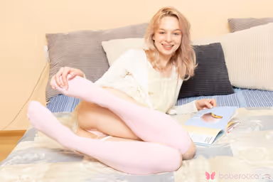 Angelic Little Blondie Elloize Arti Has A Casual Bedroom Orgasm gallery