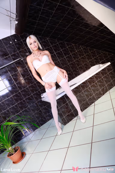 Lena Love in the bath naked with her fingers buried in her pink pussy gallery